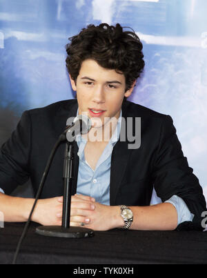 The Jonas Brothers' Nick Jonas attends a press conference about embarking on their 'Surprise Theater Invasion' at the Westchester Airport in New York on February 28, 2009.  (UPI Photo/Laura Cavanaugh) Stock Photo