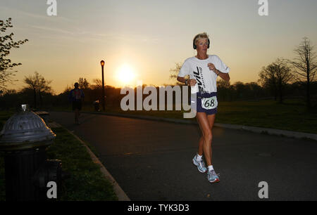 Pam Reed runs a lap at 6 AM on day two of a six day marathon race held in Corona Park in New York City on April 27, 2009.     (UPI Photo/John Angelillo) Stock Photo