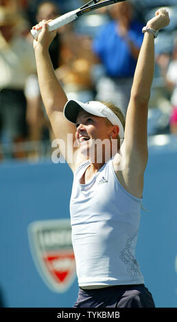 Melanie Oudin of the USA celebrates after defeating fourth-seed Elena Dementieva of Russia in three sets at the US Open tennis championship on September 3, 2009 in New York.  Oudin won 5-7, 6-4, 6-3.   UPI /Monika Graff. Stock Photo