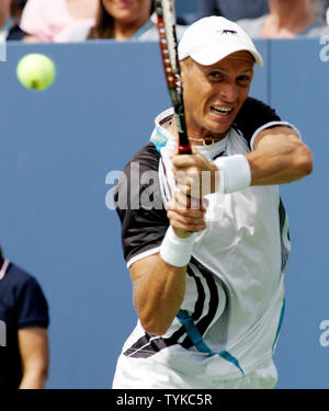 Nikolay Davydenko of Russia returns the ball to Robin Soderling of Sweden during their match at the US Open Tennis Championship on September 7, 2009 in New York.     UPI /Monika Graff      . Stock Photo