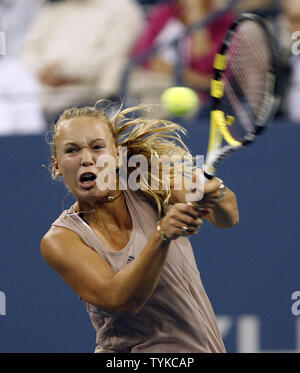 Caroline Wozniacki of Denmark hits a backhand to Melanie Oudin of the USA in their quarter final match in Arthur Ashe Stadium at the US Open Tennis Championships at the Billie Jean King National Tennis Center in New York on September 9, 2009.     UPI/John Angelillo Stock Photo