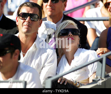 Gwen Stefani and her husband Gavin Rossdale watch the men's final at the U.S. Open tennis championship in New York, September 14, 2009.     UPI/Monika Graff Stock Photo