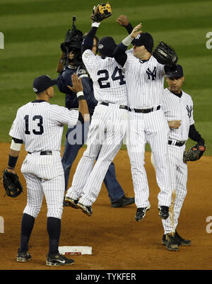 New York Yankees Mark Teixeira, Ichiro Suzuki, Robinson Cano and Derek  Jeter react after the game against the Boston Red Sox at Yankee Stadium in  New York City on July 27, 2012.