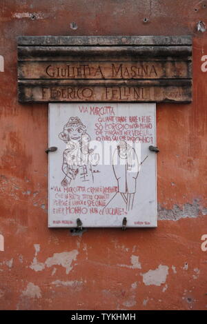 Rome, Italy - December 31, 2011: Historical inscription in memory of Federico Fellini and Gilietta Masina in Margutta Street Stock Photo
