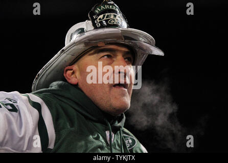 Fireman Ed and New York Jets fans make noise while the New England