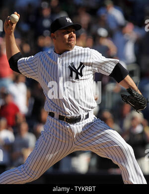 New York Yankees Alfredo Aceves pitches in the fourth inning against ...