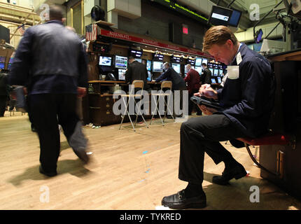 Wall Street employes are busy working moments before the opening bell on the floor of the NYSE on Wall Street in New York City on May 7, 2010.    UPI/John Angelillo Stock Photo