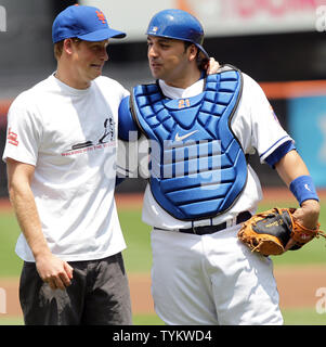 Prince Harry and Rod Barajas pose for photographs at the NY Mets