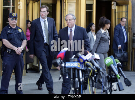 Attorney Robert Baum (C), who represented alleged Russian spy Anna Chapman, and other attorneys leave the Untied States Federal Courthouse after a hearing where ten people accused of being  Russian spies plead guilty at 500 Pearl Street in New York City on July 8,  2010.     UPI/John Angelillo Stock Photo