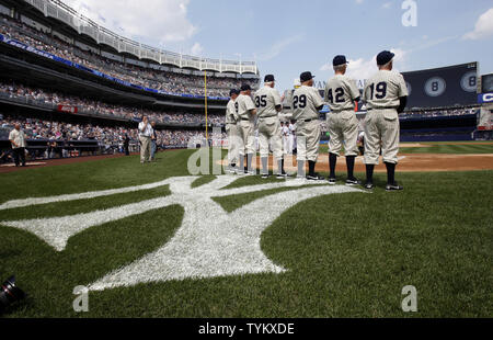 Download Derek Jeter stands in his iconic stance in Yankee stadium