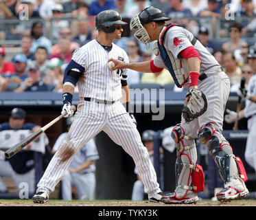 New York Yankees Melky Cabrera and Brett Gardner react after Cabrera drives  in the game winning runs in the bottom of the ninth inning against the  Minnesota Twins at Yankee Stadium in