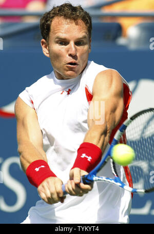 Michael Russell of the USA returns the ball to Nikolay Davydenko of Russia during first-round action at the U.S. Open held at the National Tennis Center on August 30, 2010 in New York.     UPI Photo/Monika Graff... Stock Photo