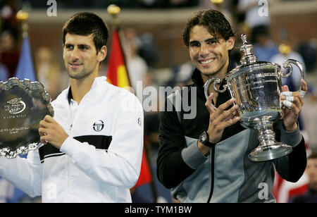 Novak Djokovic (L) of Serbia, second-place winner, and Rafael Nadal of Spain hold their trophies after Nadal won his first U.S.Open championship title at the U.S. Open held at the National Tennis Center on September 12, 2010 in New York. Nadal won  6-4 5-7 6-4 6-2.     UPI /Monika Graff Stock Photo