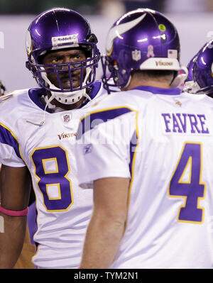 Minnesota Vikings quarterback Brett Favre watches from the sidelines during  the second half of an NFL football game against the Buffalo Bills on  Sunday, Dec. 5, 2010, in Minneapolis. Vikings won 38-14.