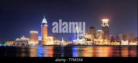 Shanghai historic architecture panorama at night lit by lights over Huangpu River Stock Photo