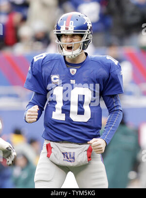 New York Giants quarterback Eli Manning releases a pass in the second  quarter against the Dallas Cowboys at Giants Stadium in East Rutherford,  New Jersey on November 11, 2007. (UPI Photo/John Angelillo