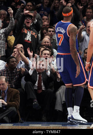 Executive Chairman of Madison Square Garden and President and CEO of Cablevision Systems Corporation James L. Dolan reacts as New York Knicks Carmelo Anthony scores a basket in the first quarter against the Milwaukee Bucks in Carmelo Anthony's first game ever as a Knick at Madison Square Garden in New York City on February 23, 2011.     UPI/John Angelillo Stock Photo