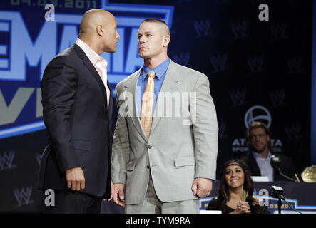 Dwayne The Rock Johnson, John Cena in attendance for WRESTLEMANIA XXVII  Press Conference, Hard Rock Cafe, New York, NY March 30, 2011. Photo By:  Rob Rich/Everett Collection Stock Photo - Alamy