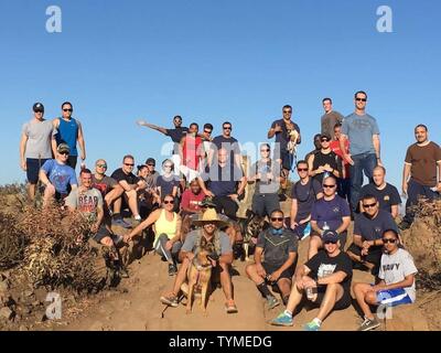 DIEGO (Nov. 17, 2016) Chief petty officers and first class petty officers assigned to Information Warfare Training Command (IWTC) San Diego hike Cowles Mountain in Mission Trails Regional Park as part of CPO 365. CPO 365 is a year-round training initiative that fosters team building and community service and demonstrates the expectations and accountability that come with earning the anchors of a chief petty officer. Stock Photo