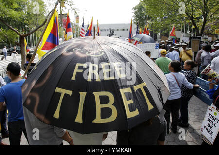 Tibetans and supporters protest the Chinese Foreign Minister, Yang Jiechi, at the United Nations headquarters in New York City, September 26, 2011.      UPI/John Angelillo Stock Photo