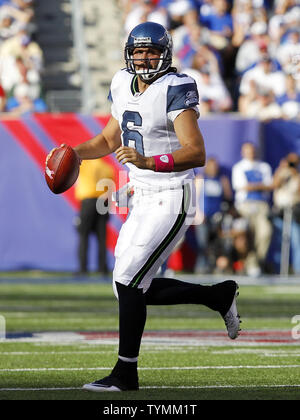 Seattle Seahawks Charlie Whitehurst rolls out of the pocket in the fourth  quarter against the New York Giants in week 5 of the NFL season at MetLife  Stadium in East Rutherford, New Jersey on October 9, 2011. The Seahawks  defeated the Giants 36-25. UPI