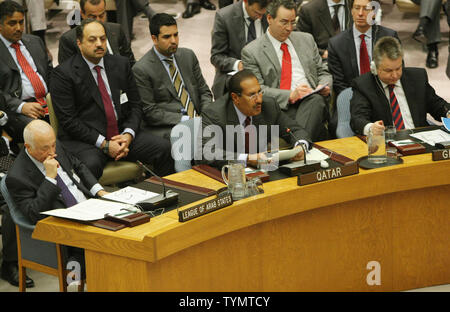 Qatar's Prime Minister Sheikh Hamad bin Jassim Al-Thani, center, urges the Security Council to support an Arab League's peace plan for Syria as Arab League Secretary-General Nabil Elaraby (L) and Michael Link, far right, Minister of the Foreign Affairs Office of Germany, listen during the Security Council meeting at the United Nations on January 31, 2012 in New York City. The proposed plan calls for the transfer of power from Syrian President Bashar al-Assad to his deputy and for free elections to be held.     UPI/Monika Graff Stock Photo