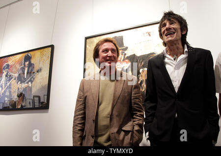 Rolling Stones guitarist Ron Ronnie Wood and Faces Drummer Kenny Jones arrive at a press conference at the opening of an exhibition of Ronnie Wood's artwork, 'Faces, Time and Places' in New York City on April 9, 2012.       UPI/John Angelillo Stock Photo