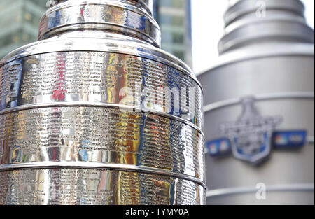 https://l450v.alamy.com/450v/tymy0a/a-21-foot-6600-pound-replica-of-the-stanley-cup-stands-in-times-square-in-new-york-city-on-april-11-2012-the-stanley-cup-replica-also-serves-as-a-working-fountain-so-nhl-fans-can-drink-from-the-famous-trophy-upijohn-angelillo-tymy0a.jpg