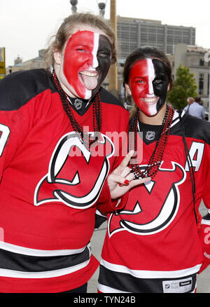 New Jersey Devils fans pose as they arrive for game 1 of the Stanley Cup Finals between the Devils and the Los Angeles Kings at the Prudential Center in Newark, New Jersey on May 30, 2012.   UPI/John Angelillo Stock Photo