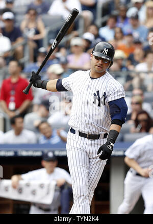 New York Yankees Nick Swisher hits a solo homer in the ninth inning against  the Toronto Blue Jays at Yankee Stadium in New York City on August 2, 2010.  The Toronto Blue