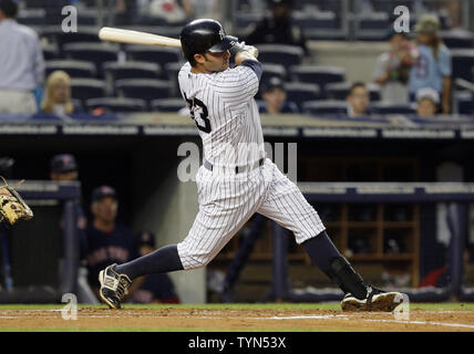 New York Yankees Melky Cabrera and Brett Gardner react after Cabrera drives  in the game winning runs in the bottom of the ninth inning against the  Minnesota Twins at Yankee Stadium in