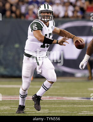 New York Jets Tim Tebow runs out of the pocket in the third quarter