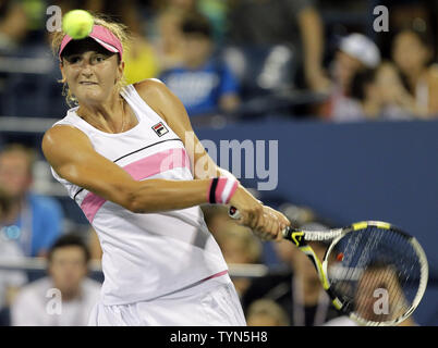 Irina-Camelia Begu of Romania hits a backhand in the first set of her first round match against Caroline Wozniacki of Denmark at the 2012 U.S. Open Tennis Championships in Arthur Ashe Stadium at the Billie Jean King National Tennis Center in New York City on August 28, 2012. Camelia Begu defeated Wozniacki  6-3, 6-2.      UPI/John Angelillo Stock Photo