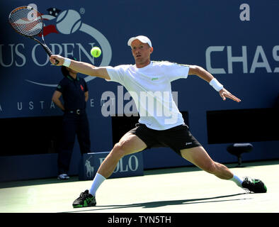 Nikolay Davydenko, Russia, returns the ball to Mardy Fish, USA, in the first set of second-round action at the 2012 U.S. Open held at the National Tennis Center on August 30, 2012 in New York.     UPI Photo/Monika Graff Stock Photo
