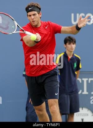 Juan Martin Del Potro, Argentina, returns the ball to Andy Roddick, USA, in the third set of their fourth-round match during the 2012 U.S. Open held at the National Tennis Center on September 5, 2012.     UPI Photo/Monika Graff Stock Photo
