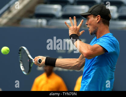 Tomas Berdych, Czech Republic, returns the ball to Andy Murray, Great Britain, in the first set of their semifinals match at the U.S. Open held at the National Tennis Center on September 8, 2012 in New York.     UPI Photo/Monika Graff Stock Photo