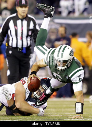 Houston, TX, USA. 23rd Sep, 2018. Houston Texans defensive end J.J. Watt  (99) sacks New York Giants quarterback Eli Manning (10) during the 3rd  quarter of a NFL football game between the