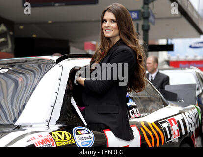 NASCAR Nation Wide Series driver Danica Patrick gets into her