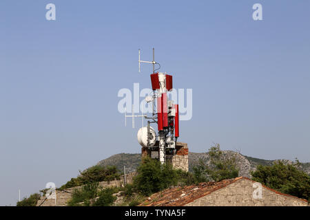 Antenna systems for telecommunication against the blue sky. Stock Photo