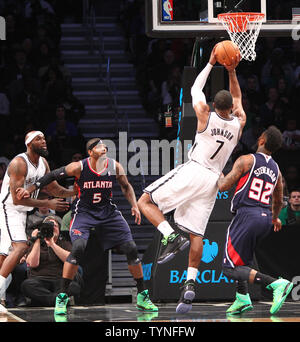 Brooklyn Nets forward Joe Johnson (7) shoots over Miami Heat forward ...