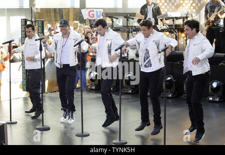 New Kids On The Block band members Danny Wood, Donnie Wahlberg, Jordan Knight, Jonathan Knight and Joey Mcintyre perform with 98 Degrees & Boyz II Men on the NBC Today Show at Rockefeller Center in New York City on May 31, 2013.       UPI/John Angelillo Stock Photo