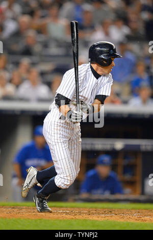 New York Yankees right fielder Ichiro Suzuki (31) grounds to third in the fourth inning against the Toronto Blue Jays at Yankee Stadium in New York City on August 21, 2013.  UPI/Rich Kane Stock Photo