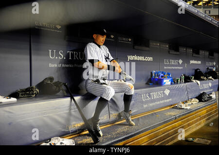 New York Yankees right fielder Ichiro Suzuki (31) sits on the bench in the fourth inning against the Toronto Blue Jays at Yankee Stadium in New York City on August 21, 2013.  UPI/Rich Kane Stock Photo