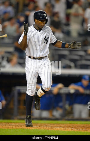 New York Yankees left fielder Alfonso Soriano (12) reacts after hitting his two run homerun in the eighth inning against the Toronto Blue Jays at Yankee Stadium in New York City on August 21, 2013.  UPI/Rich Kane Stock Photo