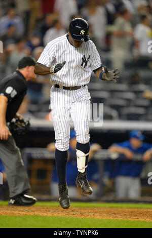 New York Yankees left fielder Alfonso Soriano (12) reacts after hitting his two run homerun in the eighth inning against the Toronto Blue Jays at Yankee Stadium in New York City on August 21, 2013.  UPI/Rich Kane Stock Photo