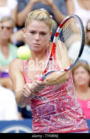 Camila Giorgi of Italy hits a backhand in her 4th round match against Roberta Vinci of Italy on day eight at the U.S. Open Tennis Championships at the USTA Billie Jean King National Tennis Center in New York City on September 2, 2013. Vinci defeated Giorgi 6-4, 6-2.   UPI/John Angelillo Stock Photo