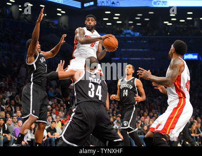 Miami Heat small forward LeBron James (6) tries to pass to Heat power forward Udonis Haslem (40) as Brooklyn Nets small forward Paul Pierce (34), Nets shooting guard Joe Johnson (7) and Nets point guard Shaun Livingston (14) defend during the first quarter at Barclays Center in New York City on November 1, 2013.   UPI/Rich Kane Stock Photo