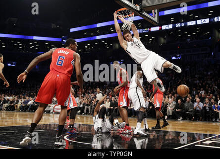 Brooklyn Nets Brook Lopez dunks the basketball in the first half against the Los Angeles Clippers at Barclays Center in New York City on December 12, 2013.     UPI/John Angelillo Stock Photo