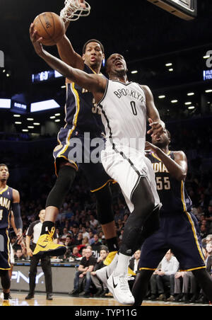 Indiana Pacers Danny Granger tries to block a shot from Brooklyn Nets Andray Blatche in the first half at Barclays Center in New York City on December 23, 2013. The Pacers defeated the Nets 103-86   UPI/John Angelillo Stock Photo
