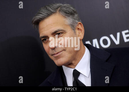 George Clooney arrives on the red carpet at 'The Monuments Men' premiere at the Ziegfeld Theatre in New York City on February 4, 2014.      UPI/Dennis Van Tine Stock Photo